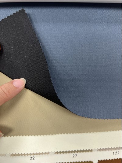 GZ-JT 66005-5# 成分：表面100%T 幅寬：142±2.5cm  透明膜+飄紗  克重：157g/㎡ 正面照